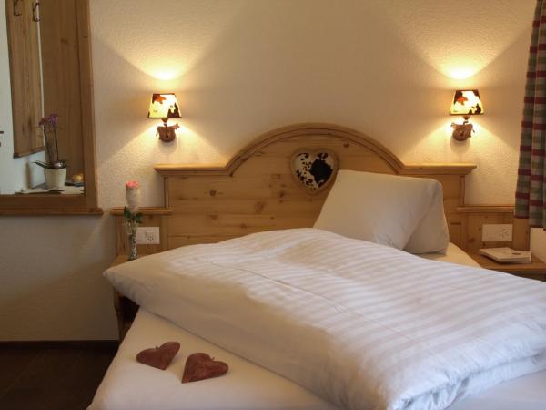 Hotel Caprice - Grindelwald : photo 6 de la chambre hébergement simple confort