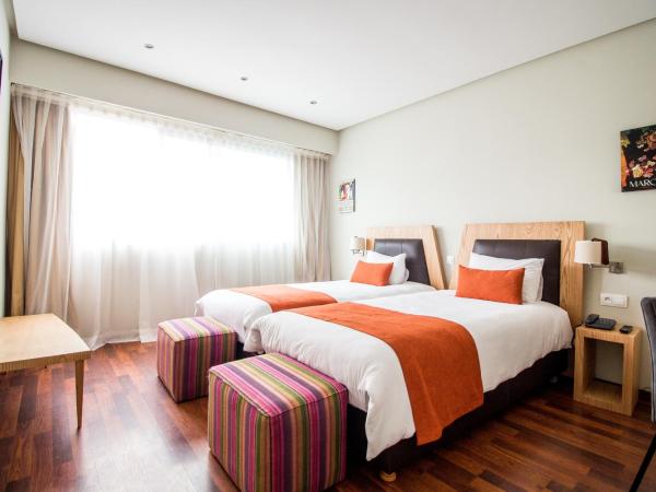 Le Pietri Urban Hotel : photo 10 de la chambre chambre lits jumeaux standard