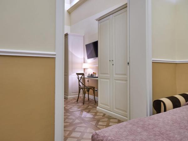 B&B Le Stanze del Duomo : photo 9 de la chambre chambre familiale (2 adultes et 2 enfants)