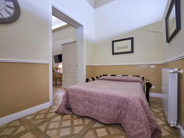 B&B Le Stanze del Duomo : photo 7 de la chambre chambre familiale (2 adultes et 2 enfants)