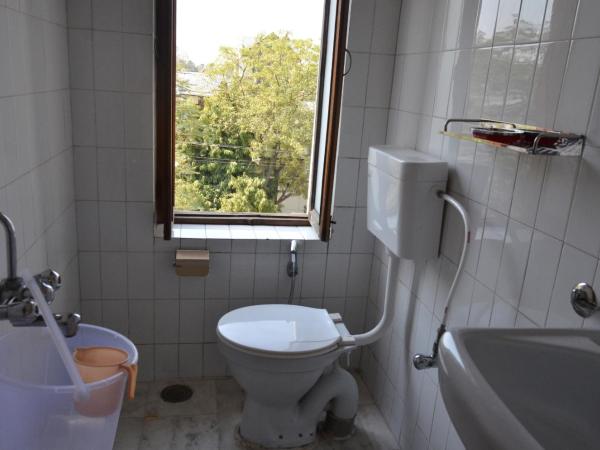 Sneh Deep Guest House : photo 9 de la chambre chambre triple avec balcon