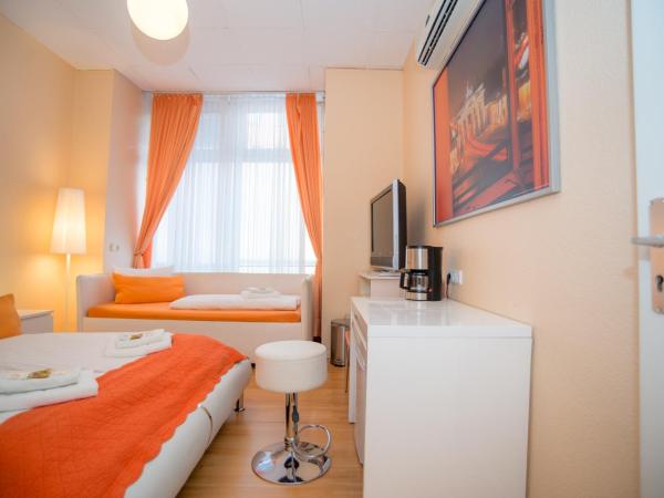 City Guesthouse Pension Berlin : photo 2 de la chambre chambre triple