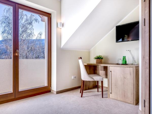 Zamek Księża Góra : photo 4 de la chambre chambre double ou lits jumeaux standard