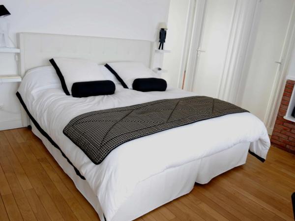 Au Coeur De Beauvais : photo 5 de la chambre suite supérieure lit king-size