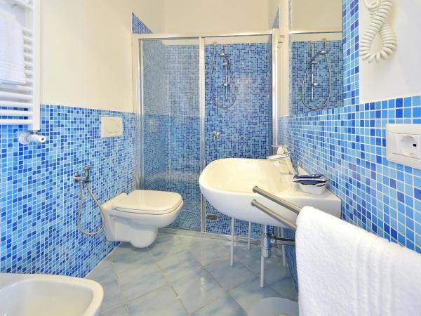 BnB Le Isole : photo 7 de la chambre chambre double ou lits jumeaux - vue sur jardin