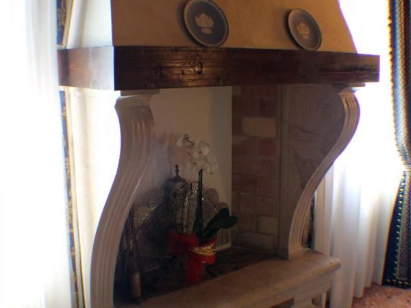 Hotel Palazzo Abadessa : photo 5 de la chambre chambre double deluxe - vue sur jardin