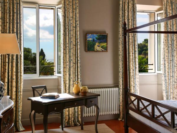 Château de Valmer : photo 5 de la chambre suite junior - vue sur piscine ou palmeraie 