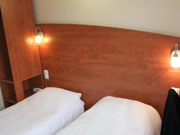 Adams Hotel : photo 8 de la chambre chambre lits jumeaux