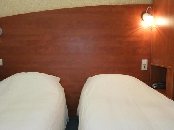 Adams Hotel : photo 3 de la chambre chambre lits jumeaux