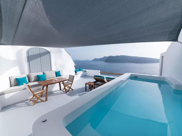 Maregio Suites : photo 1 de la chambre suite lune de miel avec petite piscine extérieure chauffée avec jets