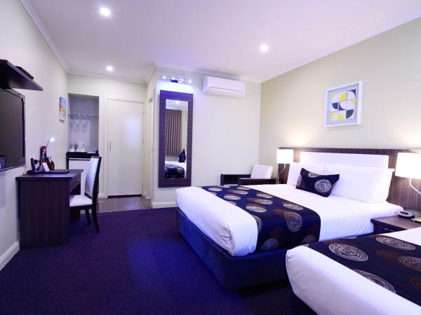 Park Squire Motor Inn & Serviced Apartments : photo 1 de la chambre chambre lits jumeaux supérieure