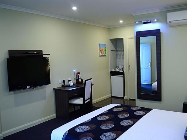 Park Squire Motor Inn & Serviced Apartments : photo 1 de la chambre chambre supérieure lit queen-size