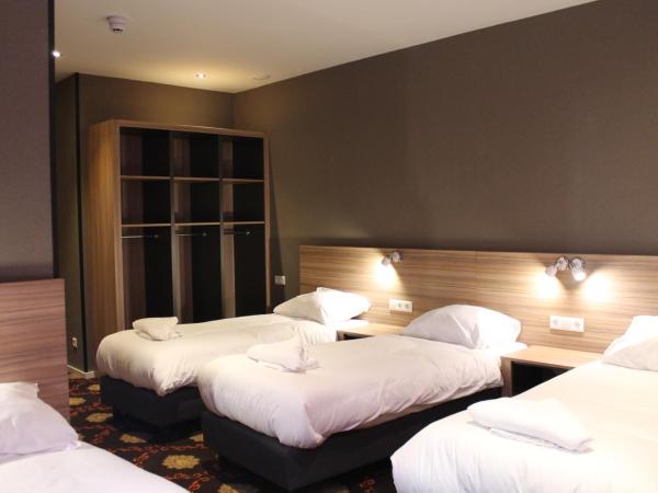 Aston City Hotel : photo 1 de la chambre chambre quadruple