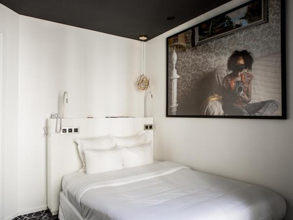 Le Général Hôtel : photo 3 de la chambre chambre cosy avec lit double