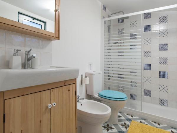 Old Town Lx Suites : photo 1 de la chambre chambre lit queen-size avec patio