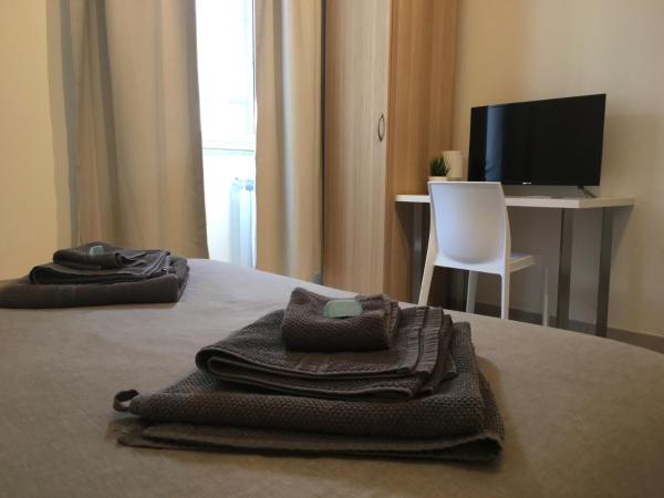 Romano Rooms : photo 1 de la chambre chambre triple avec salle de bains privative