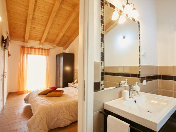 B&B Al sogno di Laura : photo 2 de la chambre chambre double deluxe avec lit d'appoint