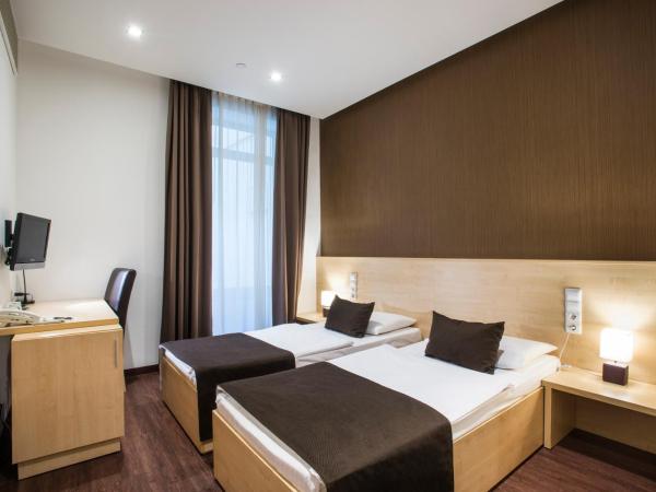 Promenade City Hotel : photo 4 de la chambre chambre double ou lits jumeaux