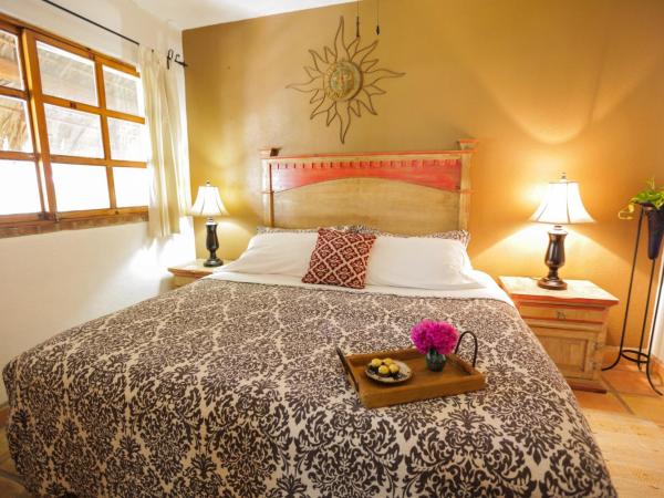 The Bungalows Hotel : photo 2 de la chambre suite lit king-size