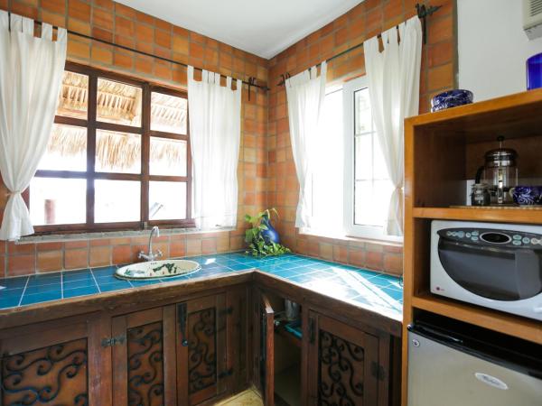 The Bungalows Hotel : photo 4 de la chambre suite lune de miel