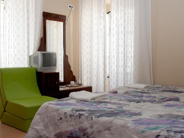 Guest House Capitao Mor : photo 10 de la chambre chambre double ou lits jumeaux avec salle de bains commune