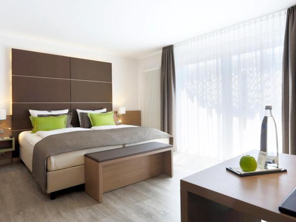 Lindner Hotel Dusseldorf Airport, part of JdV by Hyatt : photo 4 de la chambre chambre lit king-size premium