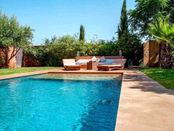 Al Maaden Villa Hotel & Spa : photo 1 de la chambre villa 2 chambres avec piscine sans vis-à-vis