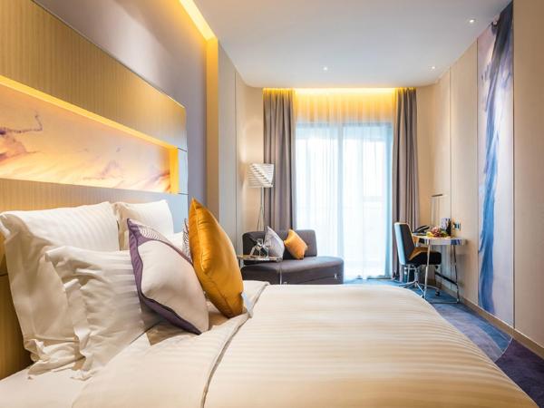 Novotel Suzhou Sip : photo 5 de la chambre chambre lit king-size supérieure