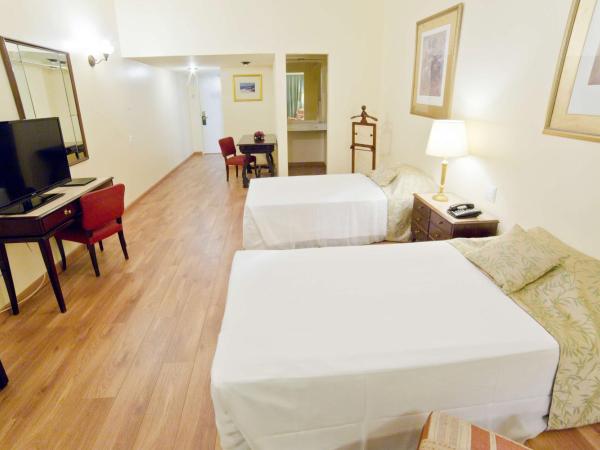 Dayrell Hotel e Centro De Convenções : photo 2 de la chambre chambre lit queen-size deluxe