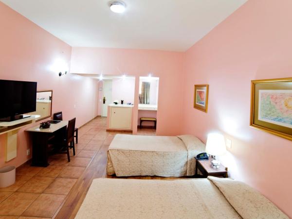 Dayrell Hotel e Centro De Convenções : photo 5 de la chambre chambre lit queen-size deluxe