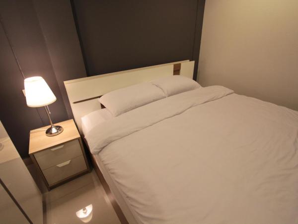 Napaville Huai Khwang : photo 1 de la chambre chambre lit king-size