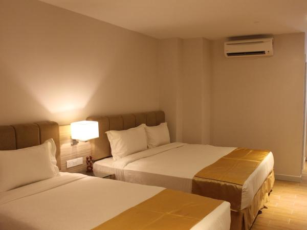 NU Hotel @ KL Sentral : photo 1 de la chambre chambre triple deluxe