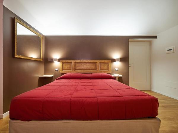 B&B Le Stanze del Duomo : photo 3 de la chambre chambre familiale (2 adultes et 2 enfants)