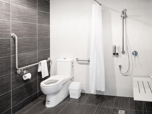 Lily Sands Inn : photo 6 de la chambre chambre lit king-size - accessible aux personnes à mobilité réduite