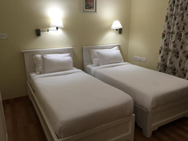 Daffodils Spice Court : photo 2 de la chambre chambre deluxe double ou lits jumeaux