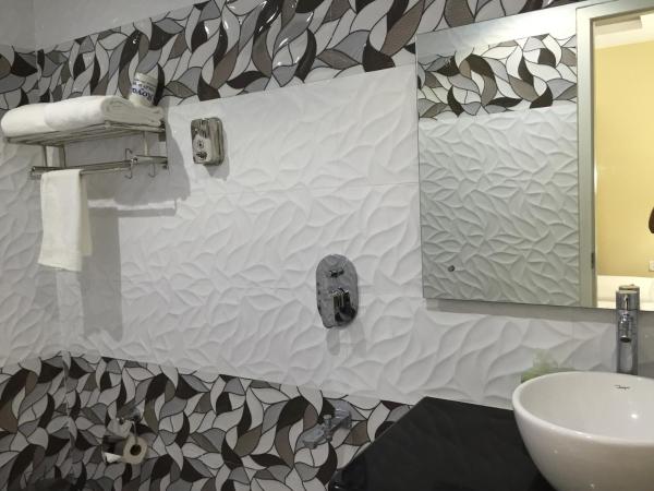 Daffodils Spice Court : photo 8 de la chambre chambre supérieure lit queen-size