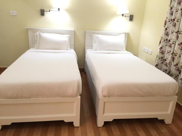 Daffodils Spice Court : photo 3 de la chambre chambre deluxe double ou lits jumeaux