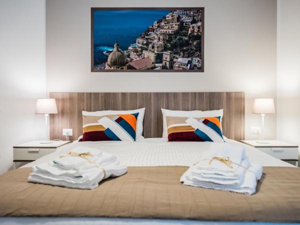 Panoramic Rooms Salerno Affittacamere : photo 3 de la chambre chambre triple