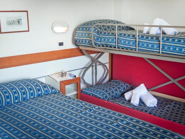 Hotel Melita : photo 1 de la chambre chambre quadruple
