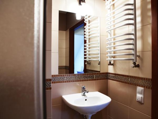 Hotel Trzy Róże : photo 5 de la chambre chambre lits jumeaux