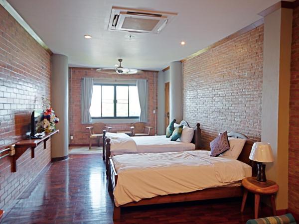 Saeng Panya Home SHA Plus : photo 2 de la chambre chambre triple deluxe