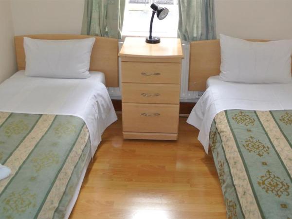 The Belgrove Hotel : photo 2 de la chambre chambre lits jumeaux avec salle de bains commune