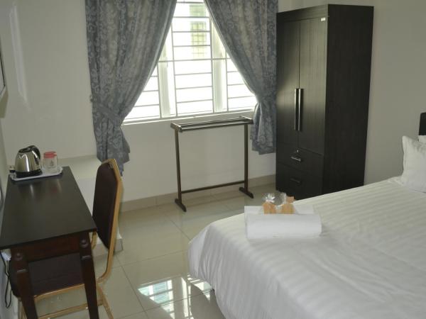 Hotel Mutiara KGMMB : photo 2 de la chambre chambre standard lit queen-size