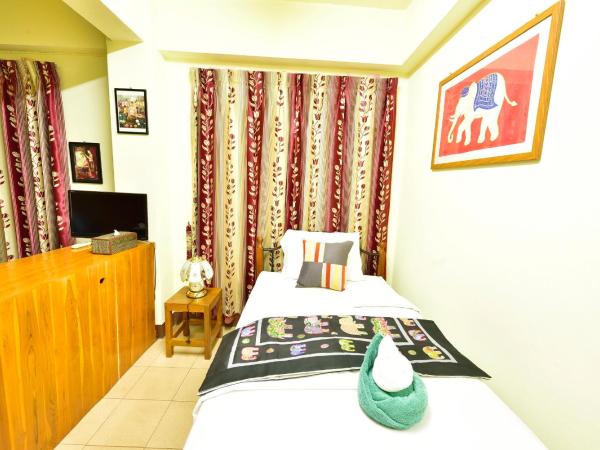 Saithong House : photo 8 de la chambre chambre triple avec balcon