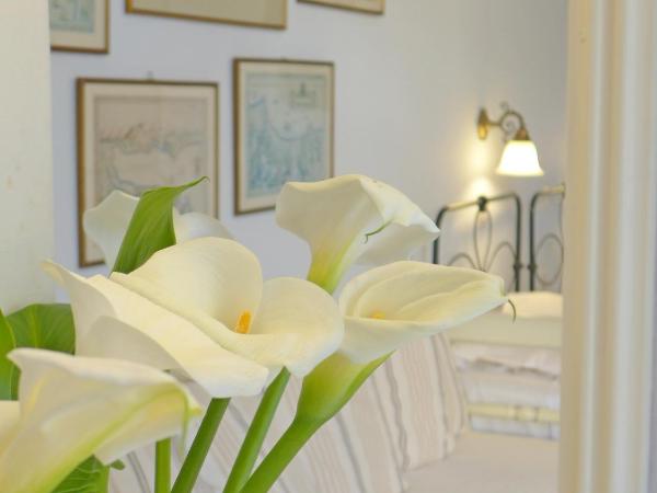 Pension Eva : photo 9 de la chambre chambre triple avec balcon