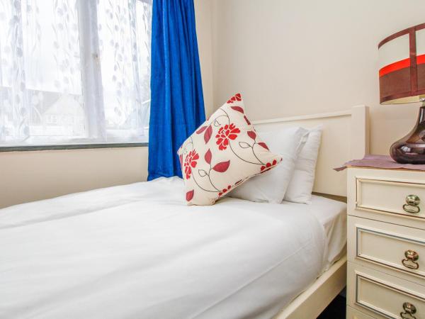 Harris Guest Accommodation : photo 6 de la chambre chambre triple