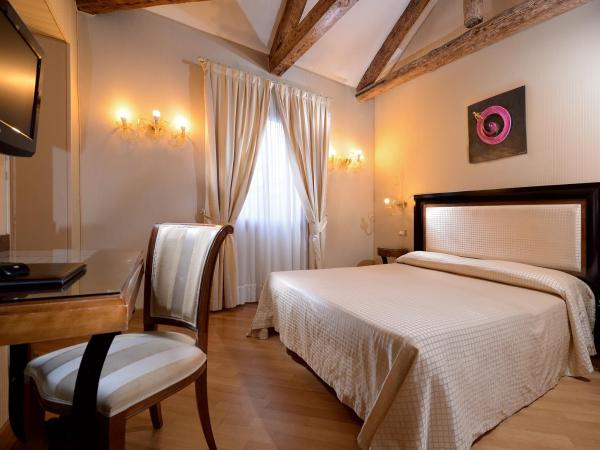 Hotel Paganelli : photo 8 de la chambre chambre triple