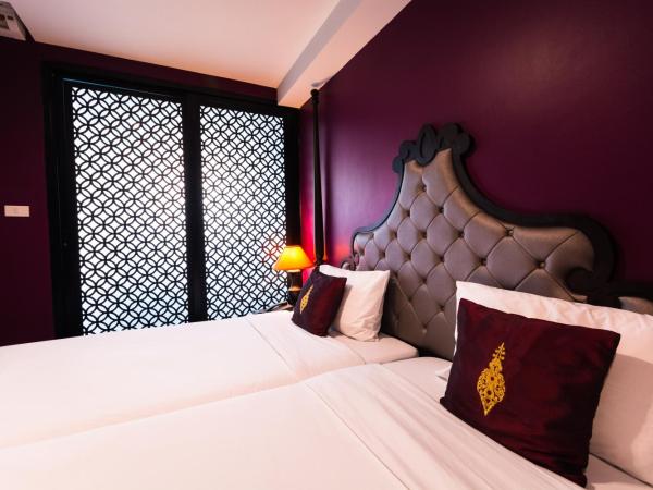Violet Tower at Khaosan Palace : photo 4 de la chambre chambre lits jumeaux violette