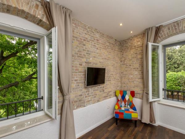 Pellegrini Luxury Rooms : photo 3 de la chambre chambre double ou lits jumeaux deluxe – vue sur jardin