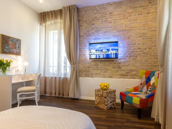 Pellegrini Luxury Rooms : photo 4 de la chambre chambre double ou lits jumeaux deluxe – vue sur jardin
